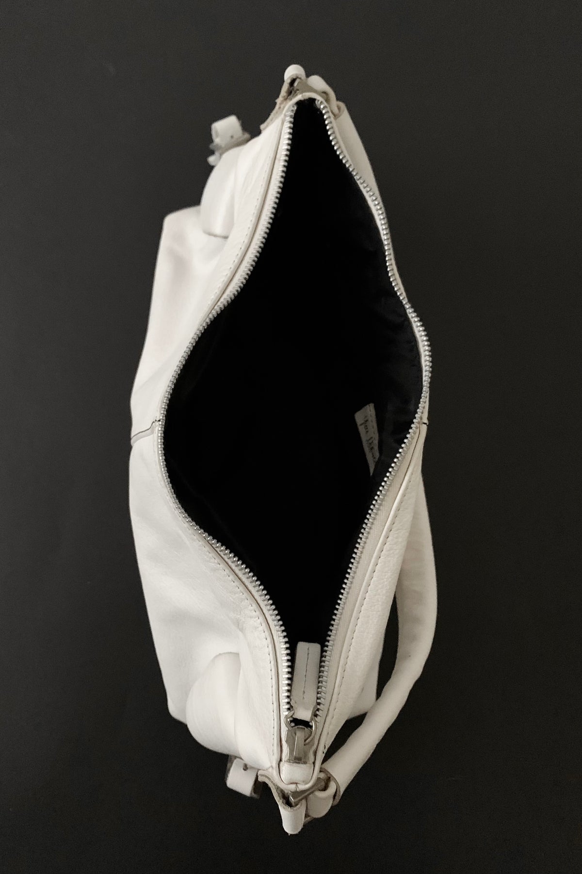 white leather side design bag