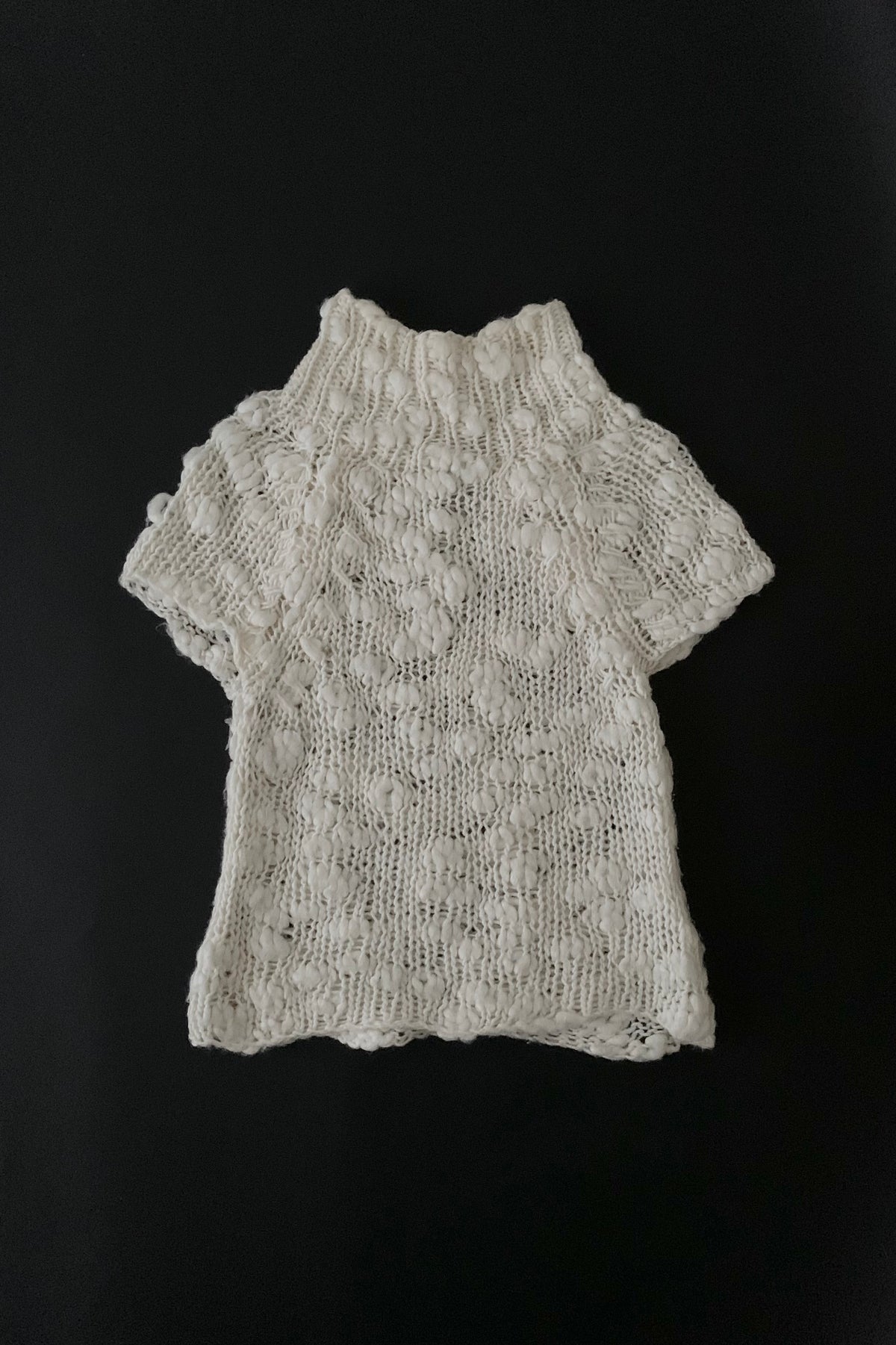ivory openwork knit tops