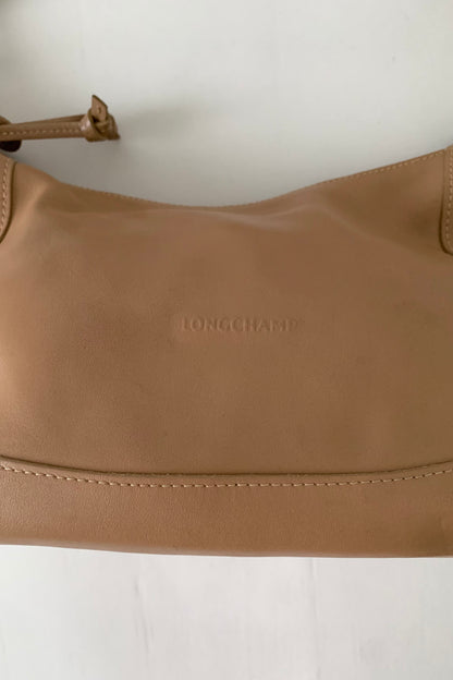 camel brown leather silver pointed bag