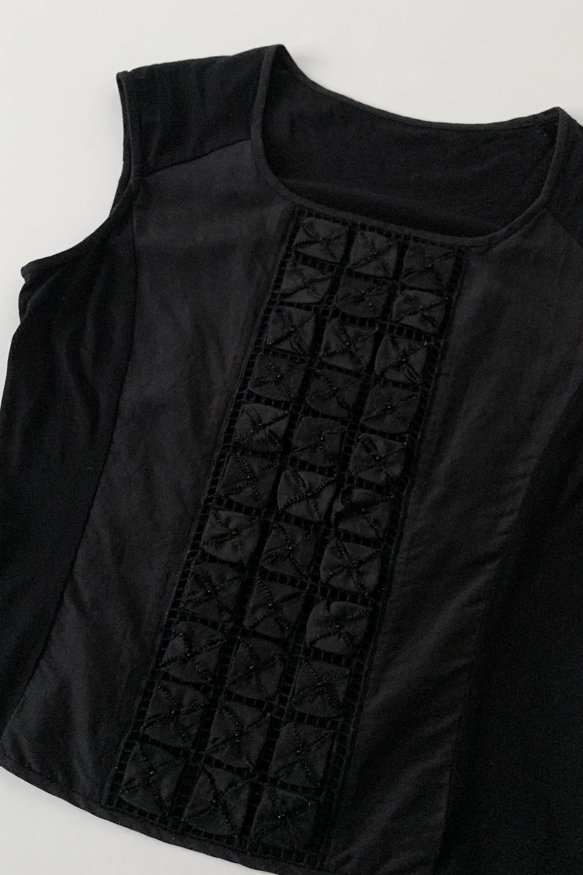 black embroidered panel design tops