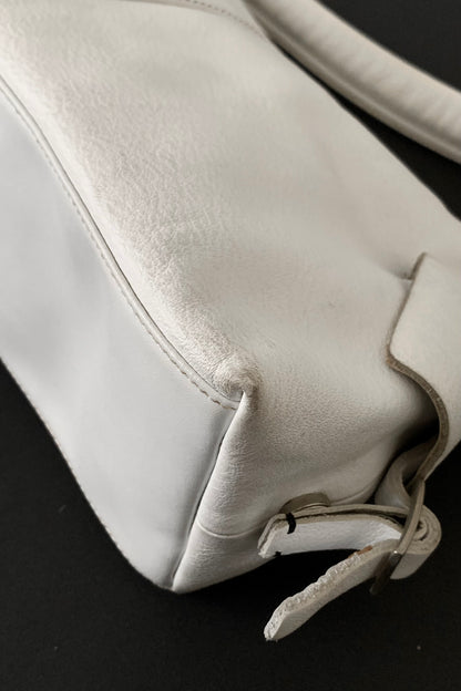 white leather side design bag