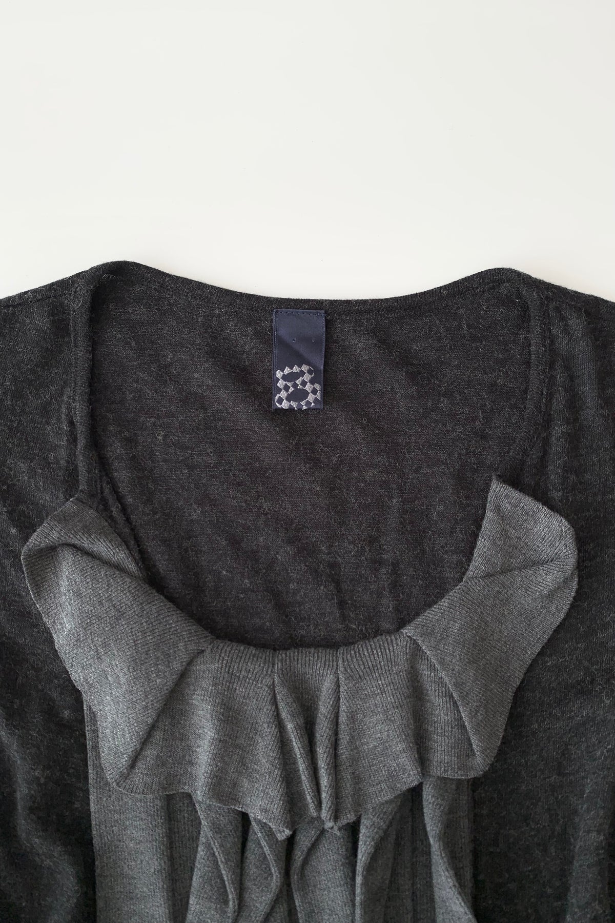 dark gray center frill knit tops