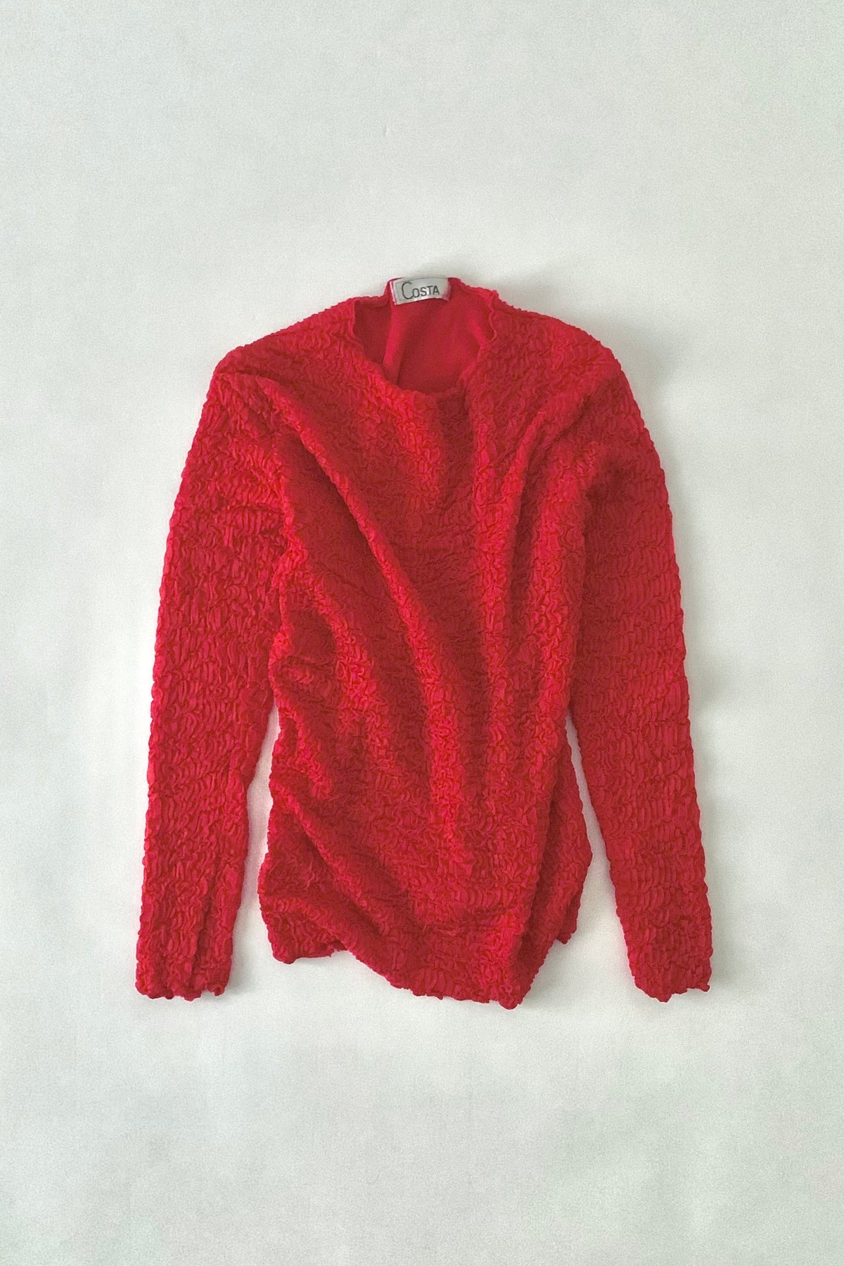 red ruffed long sleeve tops