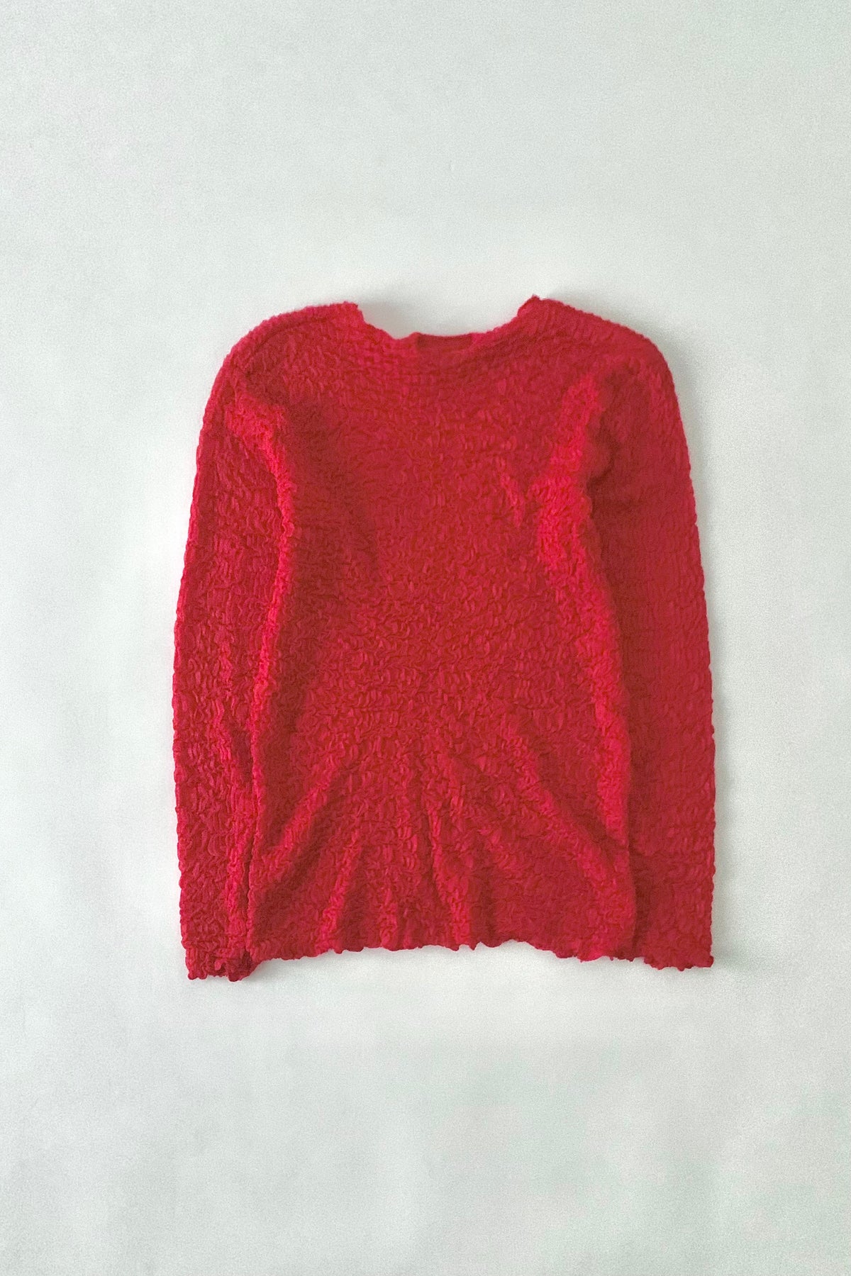 red ruffed long sleeve tops