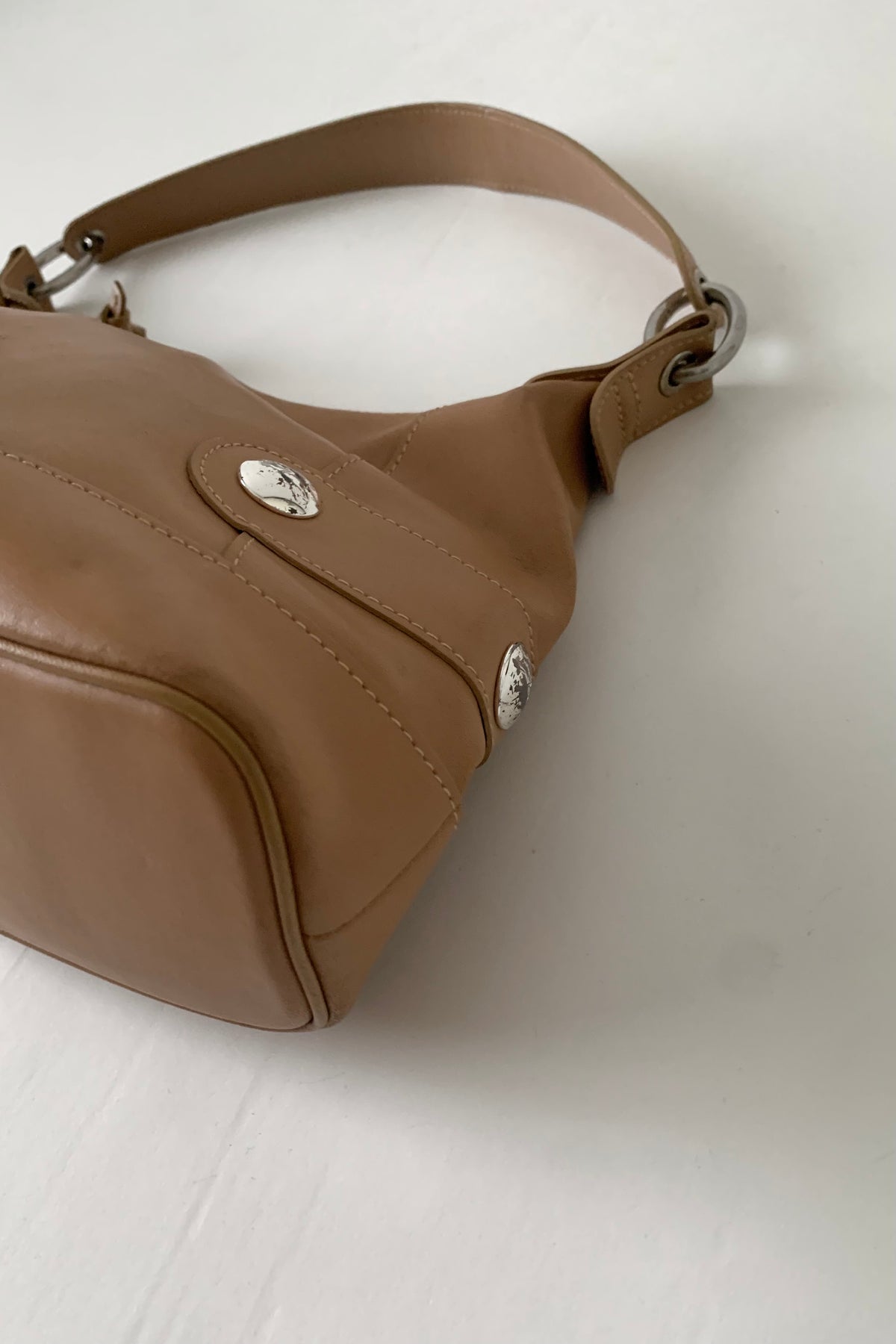 camel brown leather silver pointed bag
