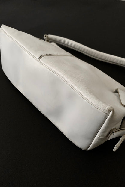 white leather side design bag