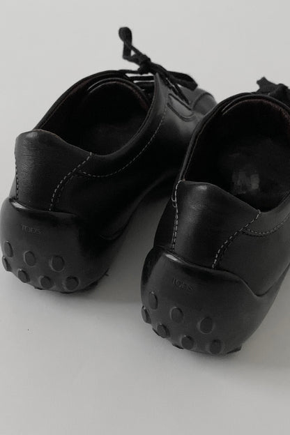 TOD’S black leather sneakers