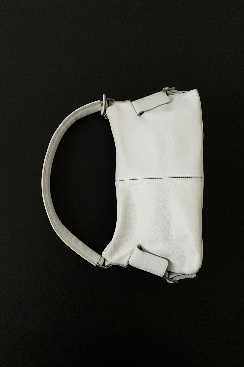 white leather side design bag