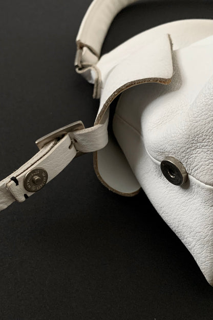 white leather side design bag