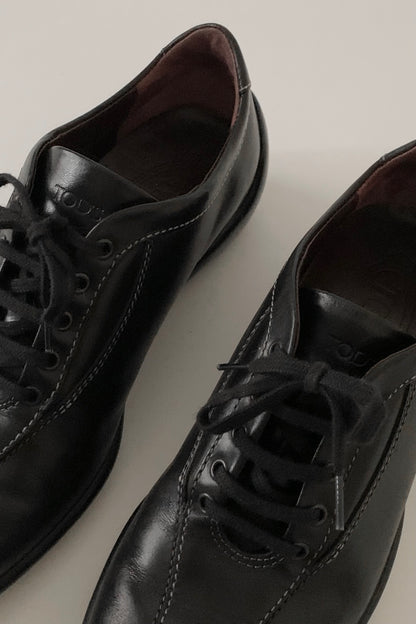 TOD’S black leather sneakers