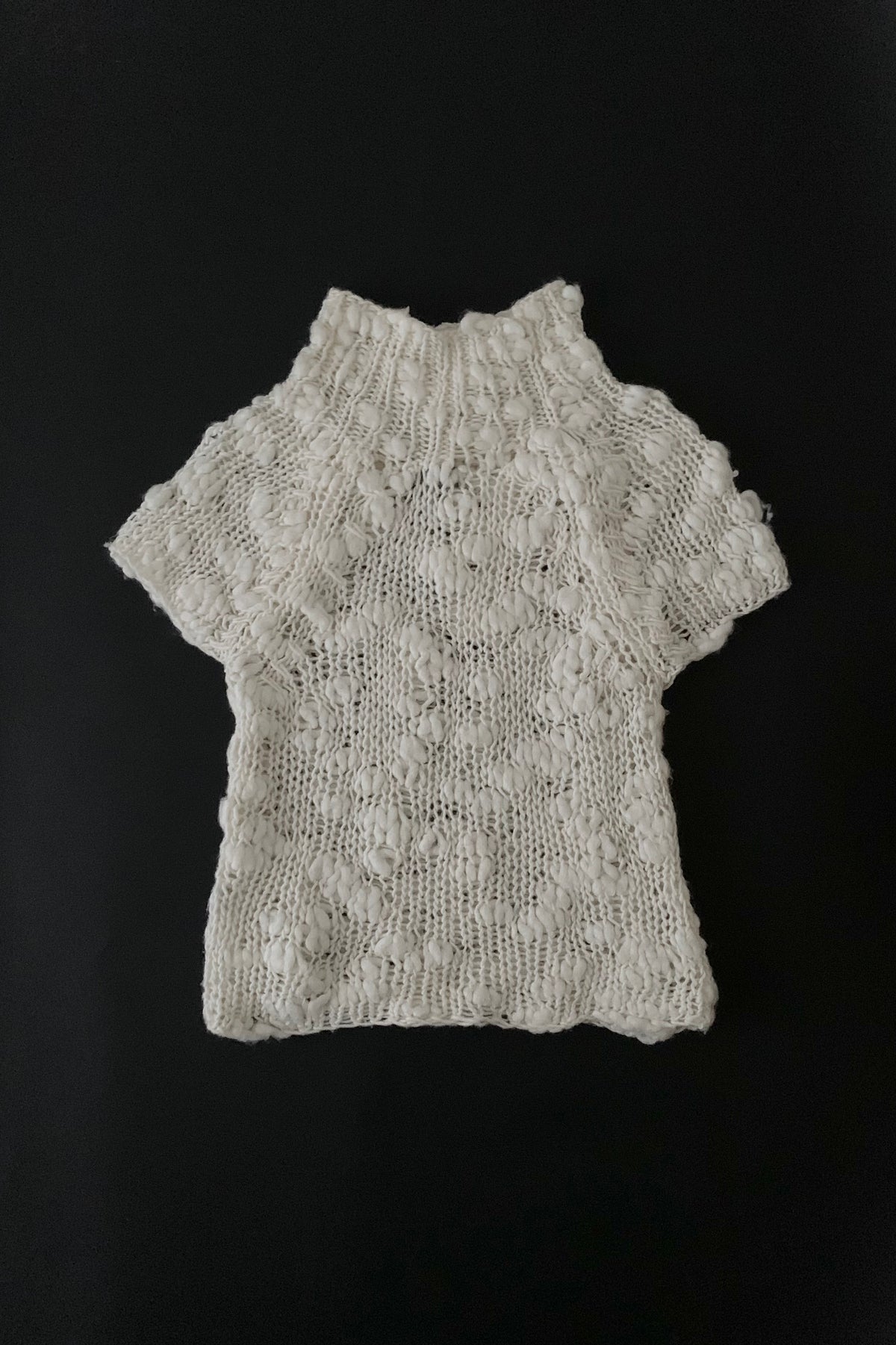 ivory openwork knit tops