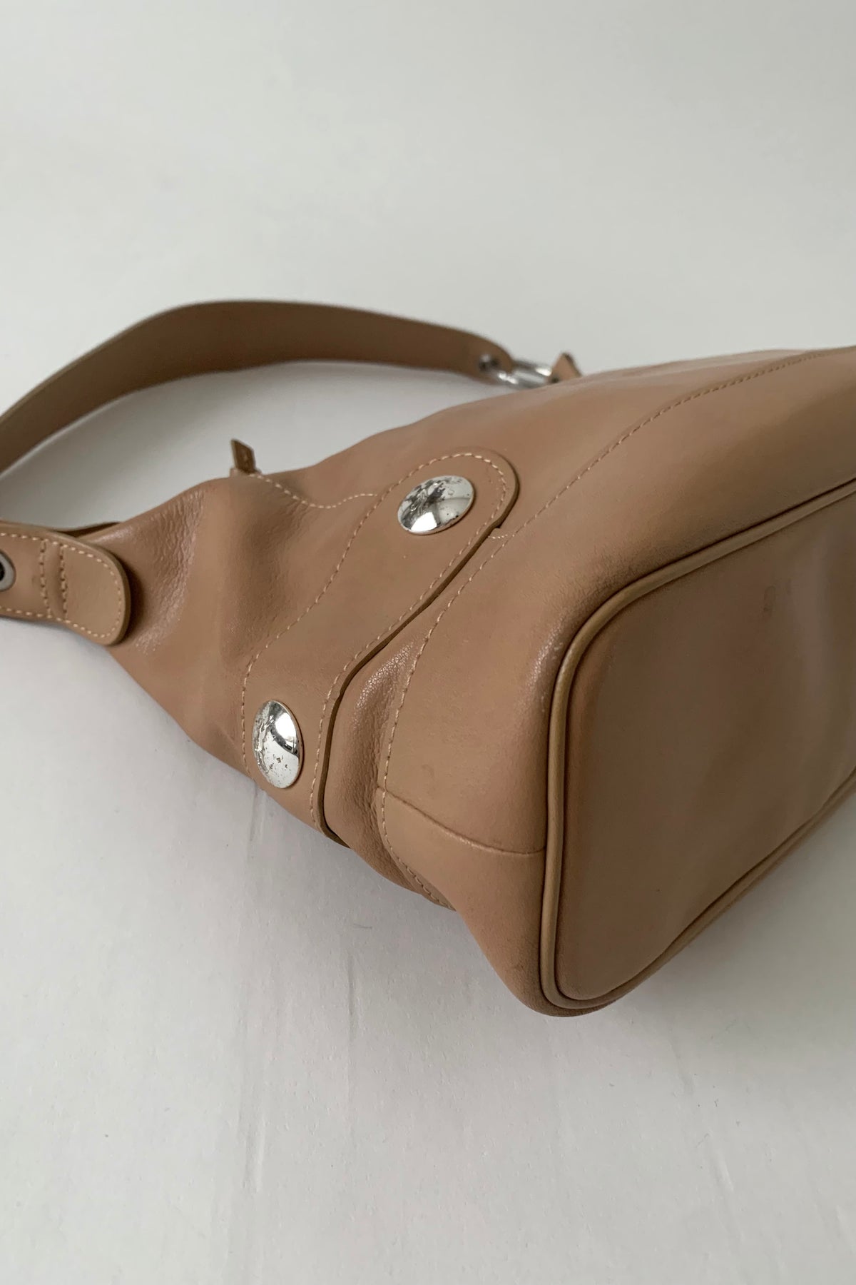 camel brown leather silver pointed bag