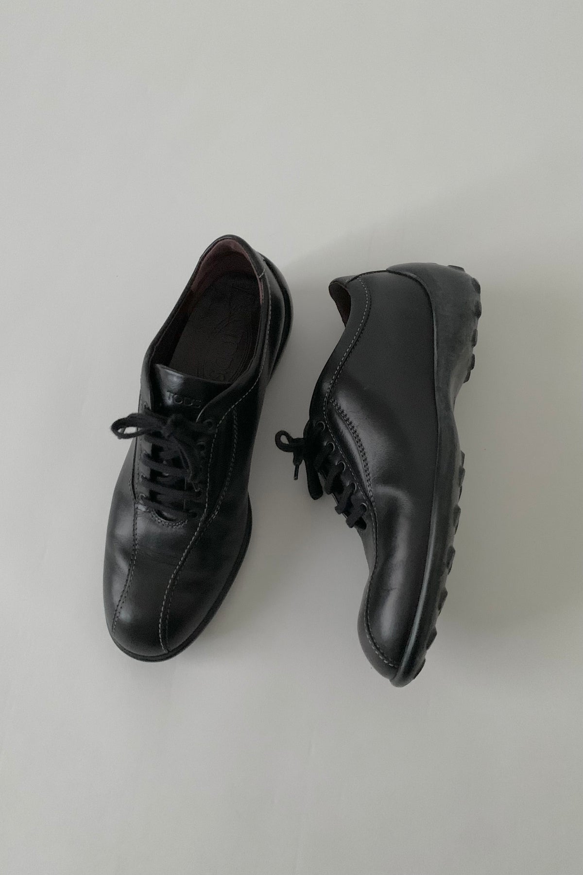 TOD’S black leather sneakers