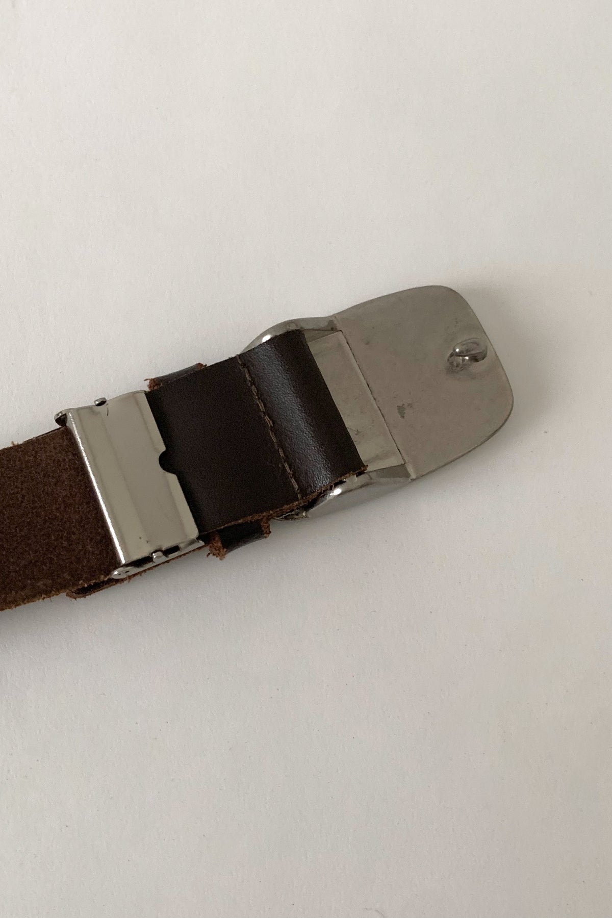 brown silver buckle belt
