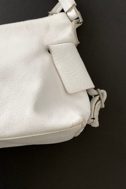 white leather side design bag